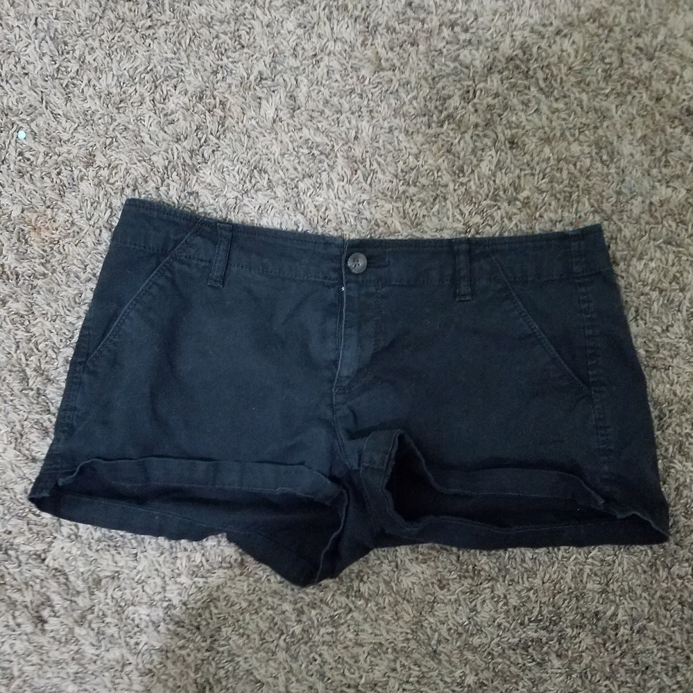 Black denim shorts.